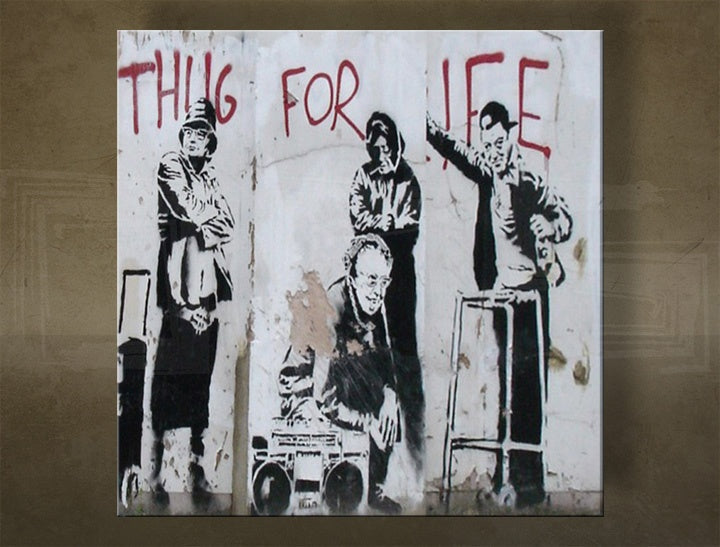 Slika na platnu s motivom banksyjev grafit thug for life – 3D prikaz platna s vidljivim drvenim okvirom, Papilora.