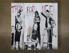 Slika na platnu s motivom banksyjev grafit thug for life – 3D prikaz platna s vidljivim drvenim okvirom, Papilora.