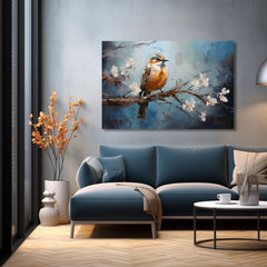 Slika na platnu s motivom ptica na grani s bijelim cvjetovima obješena u modernom stilskom interijeru iznad drvene konzole s vazom i svijećom, Papilora.